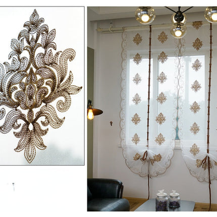 Brodert heisgardin i transparent stoff