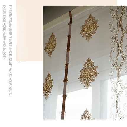 Brodert heisgardin i transparent stoff