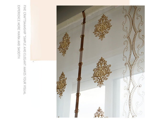 Brodert heisgardin i transparent stoff