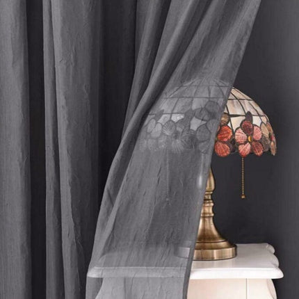 Lystett gardin med florlett overlegg