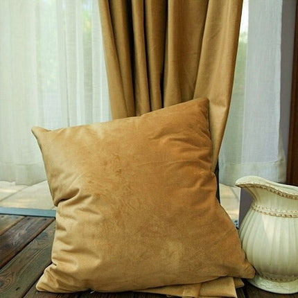 Okergul lystett gardin med maljer