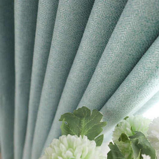 Halv-lystett gardin i en turkis farge