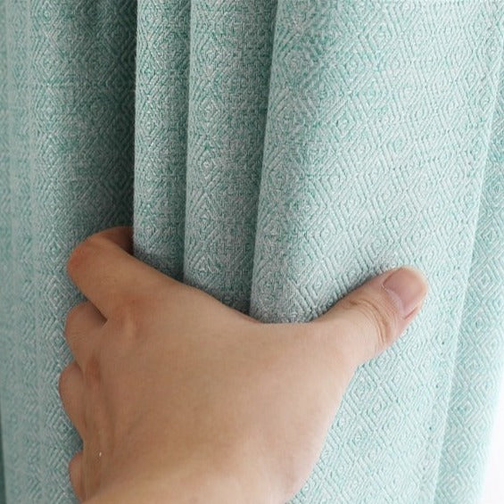 Halv-lystett gardin i en turkis farge