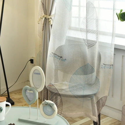 Lystett gardin med moderne bladmotiv