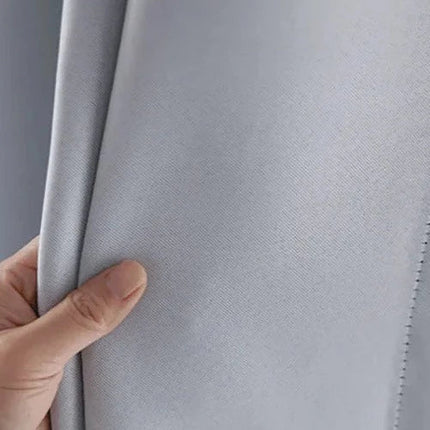 Klassisk hvit gardin med maljer