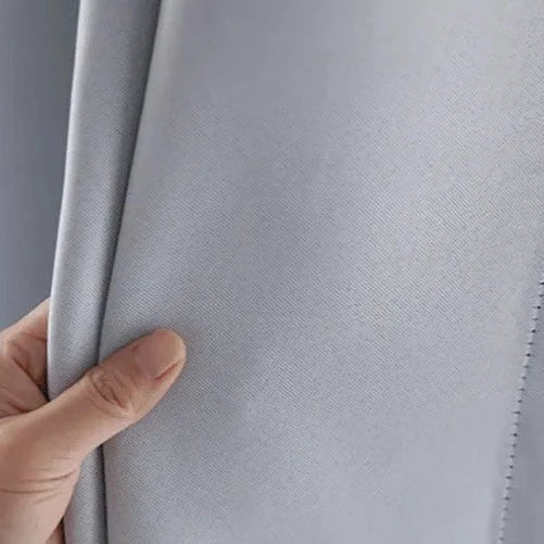 Klassisk hvit gardin med maljer