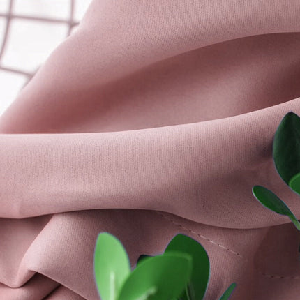 Støvrosa lystett gardin for soverom