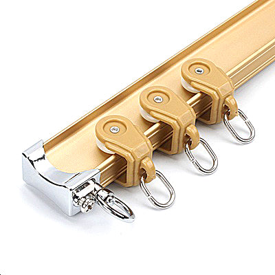 Gardinskinne for montering i taket